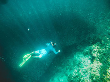 People swimming in sea