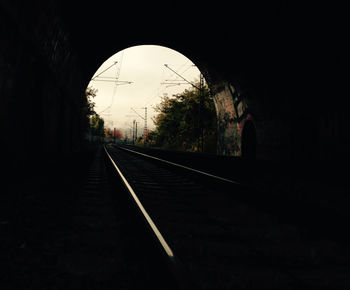 Railroad tracks in tunnel