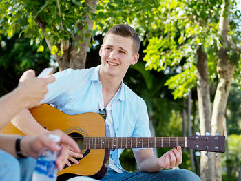 Young man playing guitar