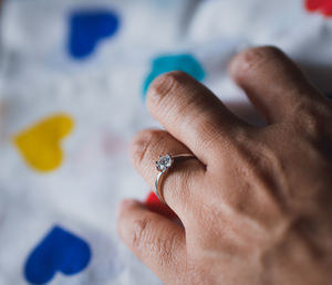 Close-up of hand wearing ring