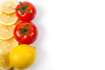 Close-up of fruits against white background