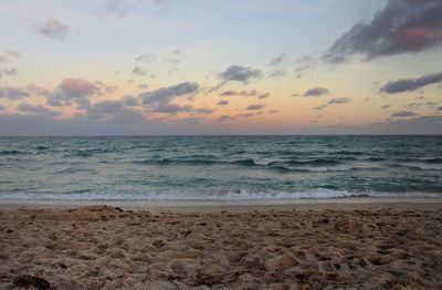 Scenic view of sea against sky during sunset