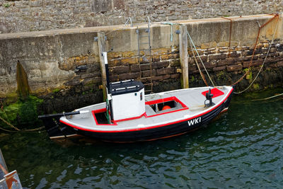 High angle view of boat moored in canal