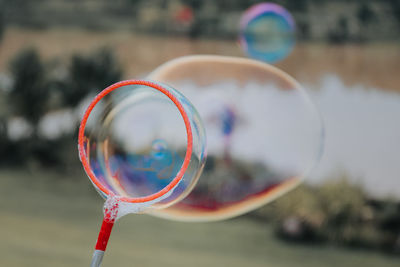 Close-up of rainbow over bubbles