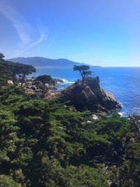 Scenic view of sea against clear blue sky