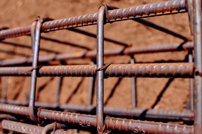 Close-up of rusty metal frame outdoors