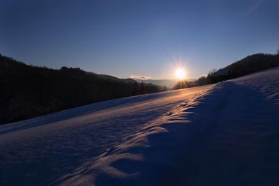 Road against sky during winter