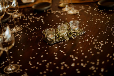 High angle view of wine glass on table