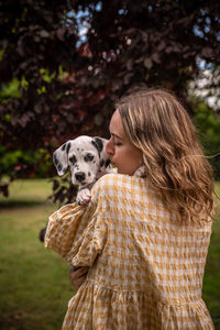 Portrait of woman with dog