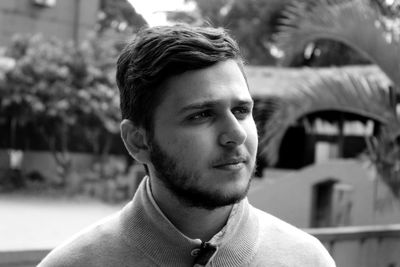 Close-up of young man looking away