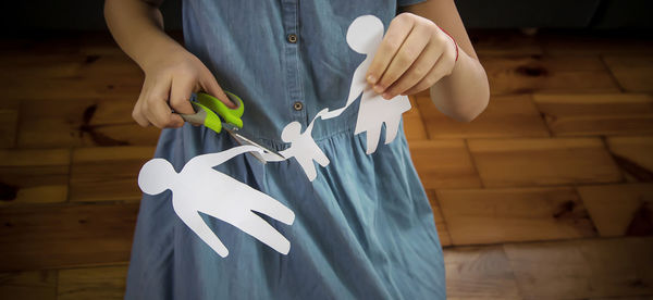 Midsection of woman holding gift box