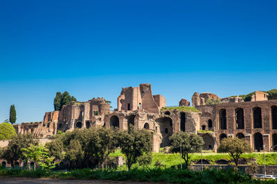 View of castle against clear blue sky