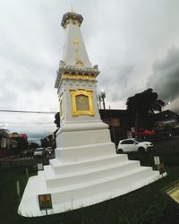 View of temple against building