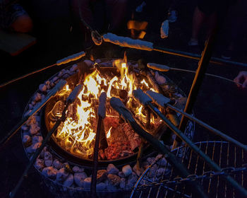 High angle view of bonfire on barbecue grill