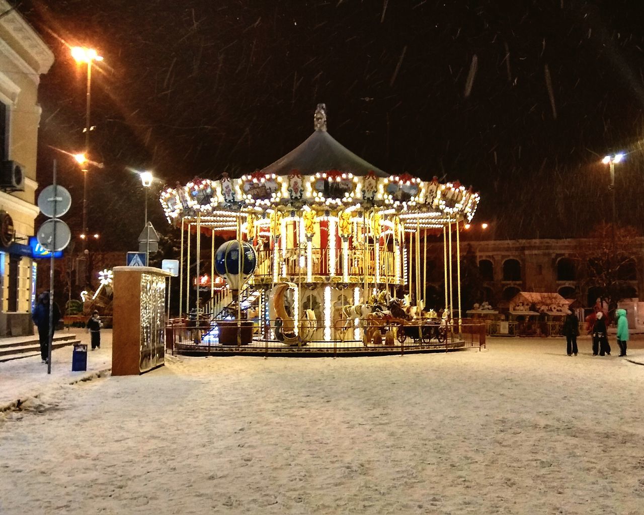 night, illuminated, amusement park, arts culture and entertainment, carousel, amusement park ride, leisure activity, fun, enjoyment, outdoors, winter, merry-go-round, no people