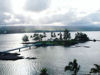 Scenic view of sea against cloudy sky