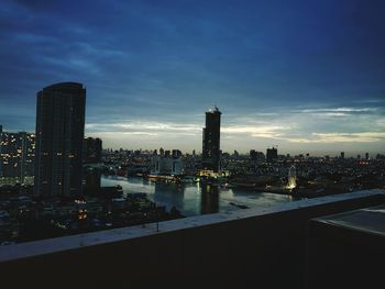 City lit up at dusk