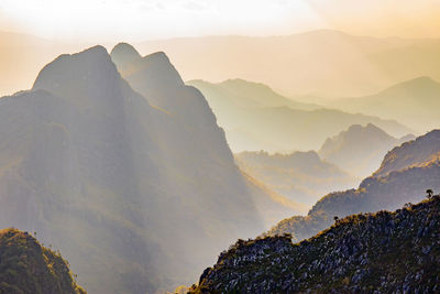 Scenic view of mountains against sky during sunset