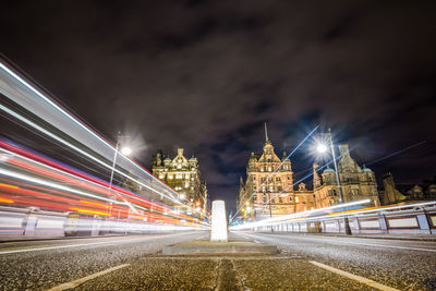 Light trails on road at night
