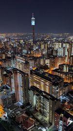 High angle view of city buildings at night