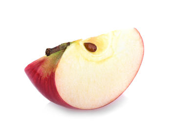 Close-up of apple against white background