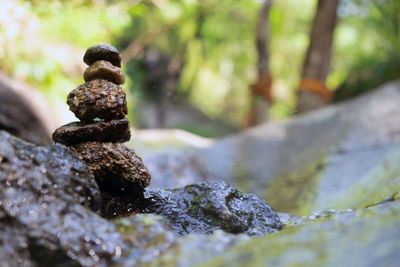 Close-up of stone stack on rock