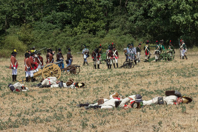 People sitting on field