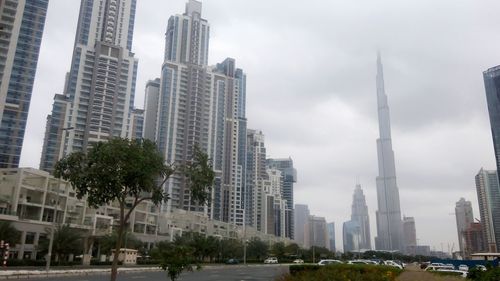 Low angle view of skyscrapers against sky