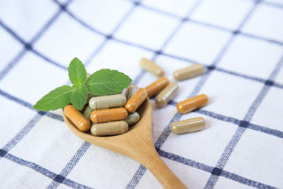 High angle view of pills on table