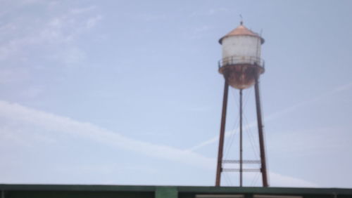 Low angle view of water tower against sky