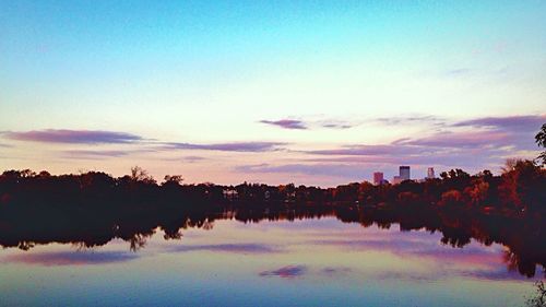 Scenic view of lake at sunset