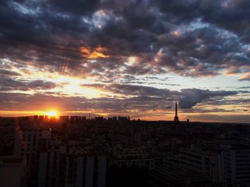 Cityscape against sky during sunset