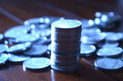 Close-up of coins on table