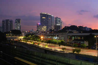 High angle view of illuminated cityscape at night