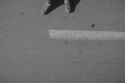 Low section of woman standing on floor