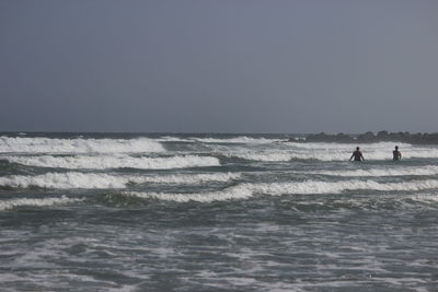 Scenic view of sea against clear sky