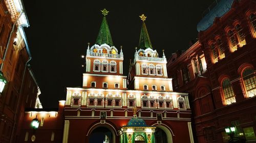 Low angle view of illuminated city at night