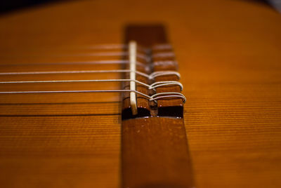 Close-up of guitar on table