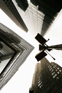 Low angle view of skyscrapers against sky