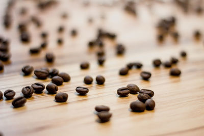 Close-up of coffee beans on table