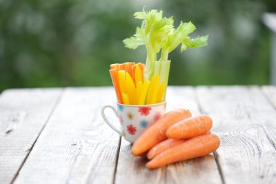 Close-up of orange juice on table