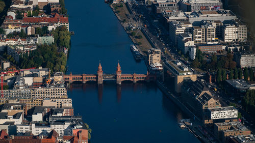 High angle view of river amidst buildings in city