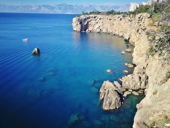 High angle view of rock formation in sea