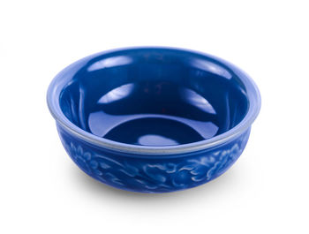 High angle view of blue glass on white background
