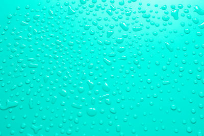 Full frame shot of wet glass window