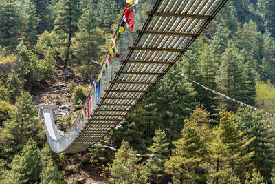 High angle view of rope on staircase in forest