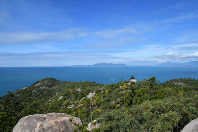 Scenic view of sea against blue sky