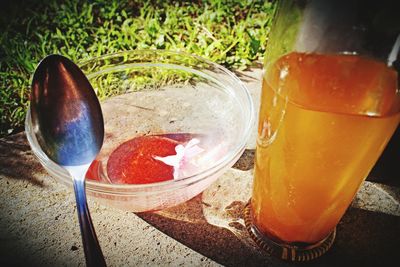 Close-up of drink in glass jar on table