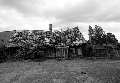 House on field against sky