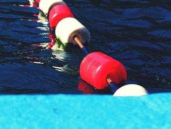 Buoys floating on river